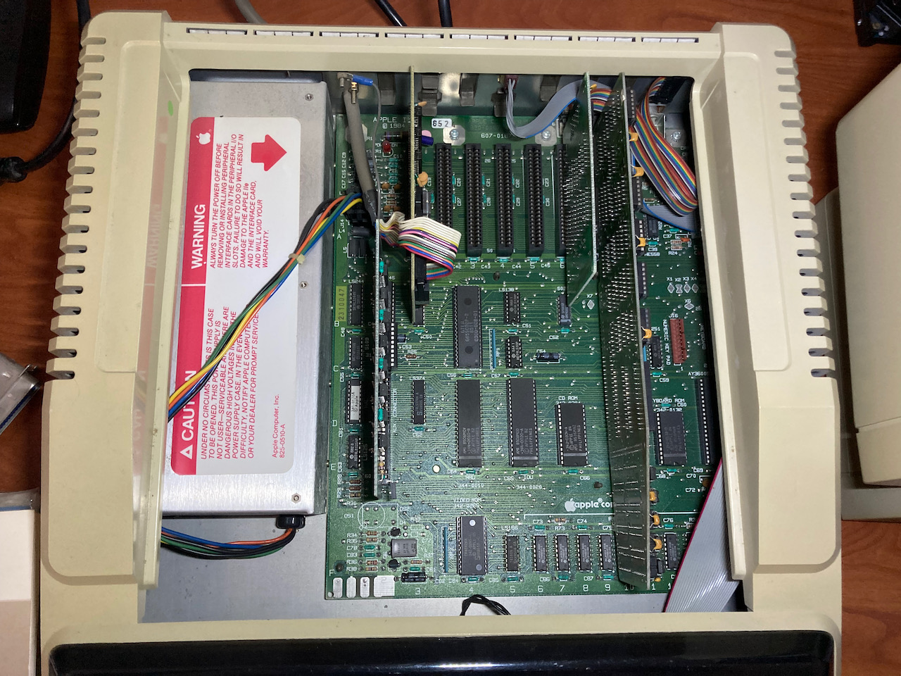 Apple IIe with cover removed and expansion boards visible